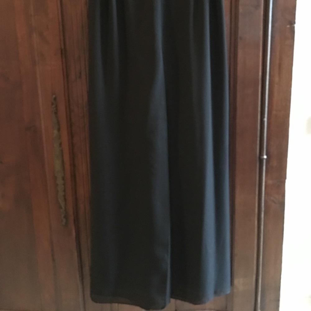 Elastic waist black chiffon pilazzo pants.